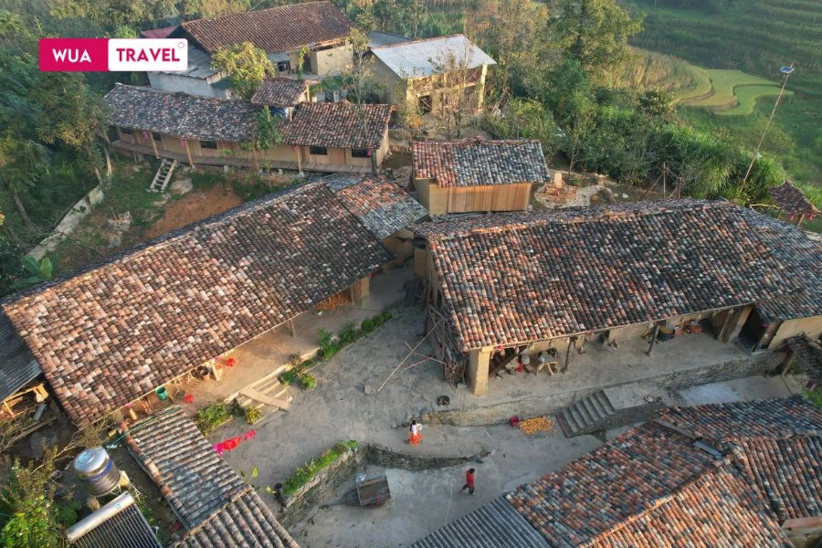 Highland village - peaceful life amidst majestic mountains and forests.