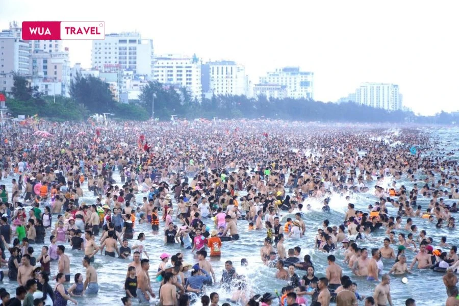 Peak tourism season - bustling travelers exploring Vietnam's beauty. 